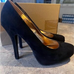 Black suede pumps